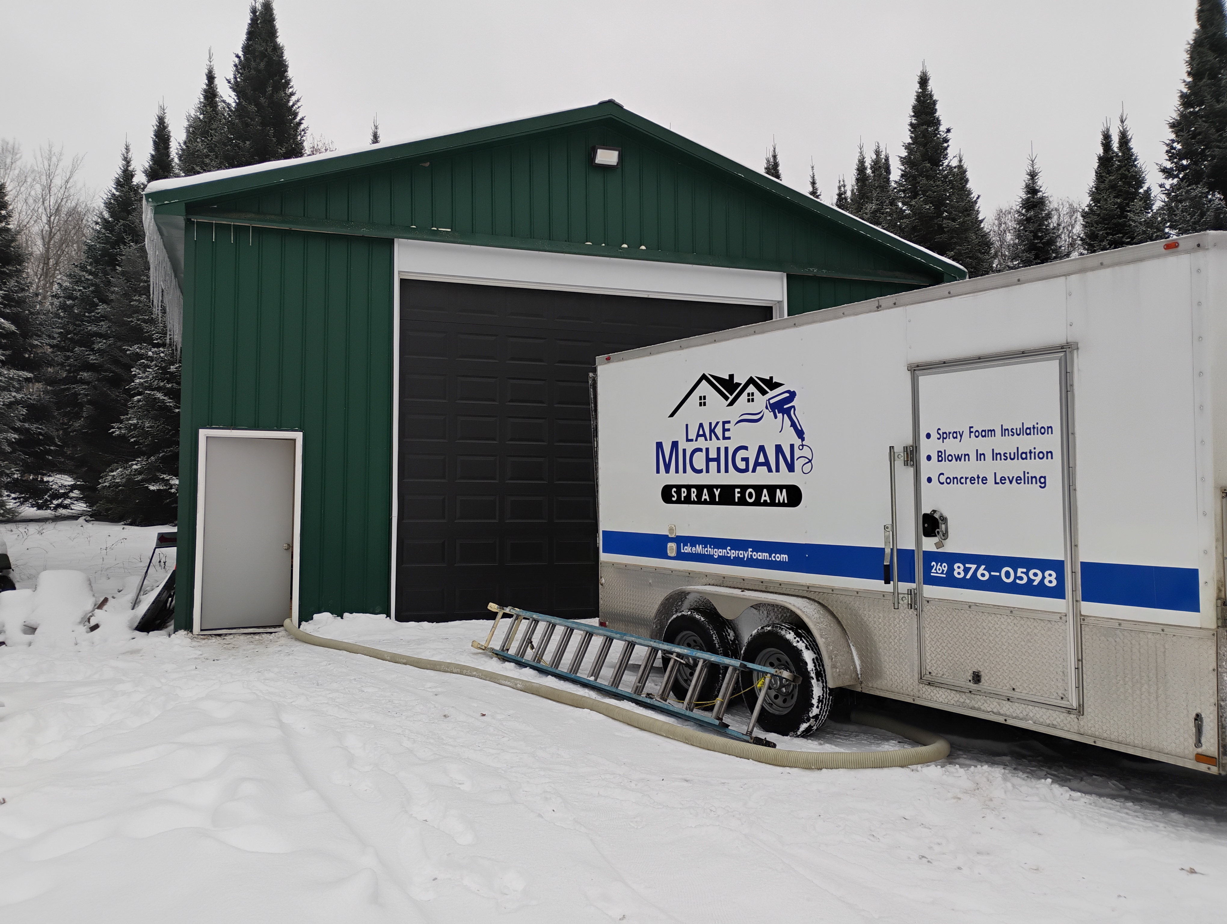 Lake Michigan Spray Foam owner and crew on residential job